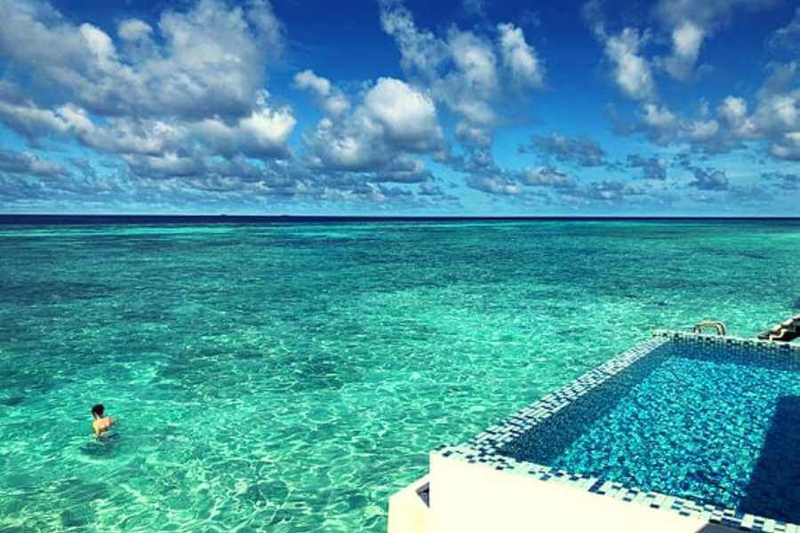 Discover Ultimate Luxury at Kooddoo Maldives Private Island 7 Over Water Sunset Pool Villa in Kooddoo Maldives Private Island